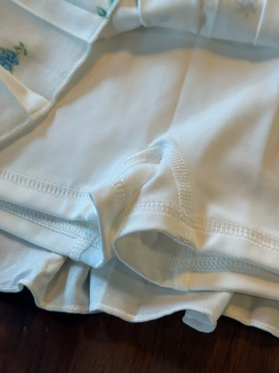 Pleated Floral Mini Skirt with shorts in White with Blue Flower Print Large - Picture 3 of 4